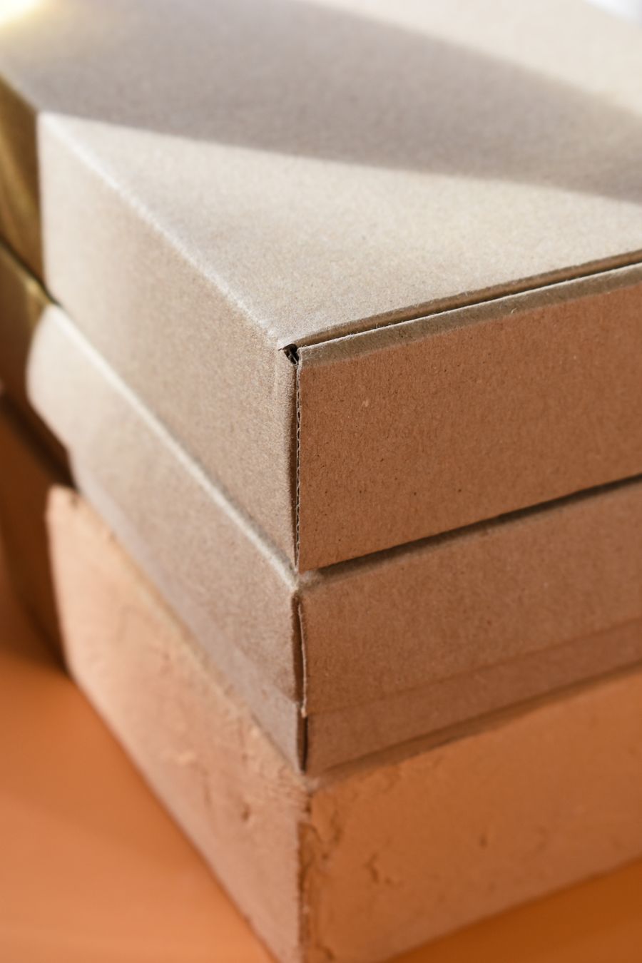 Stacked cardboard boxes for custom packaging planning